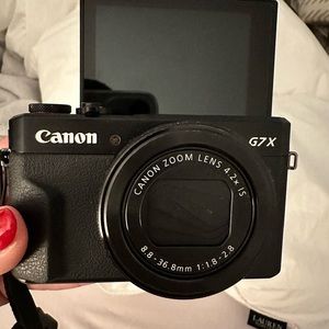 LIKE NEW CANON G7X MARK ll. Comes with all original accessories, box, & manual.